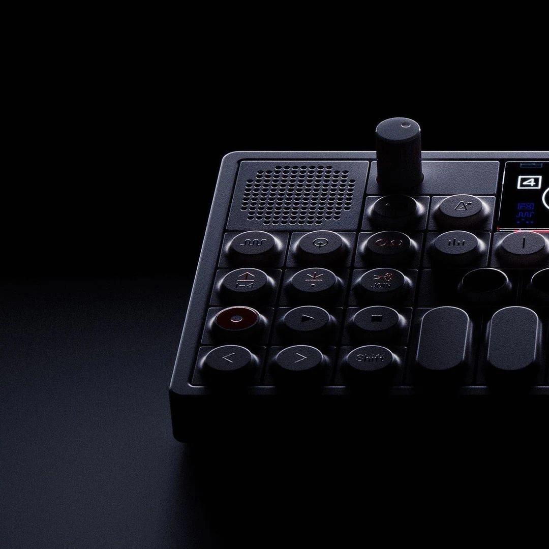 Black control surface photographed in low light